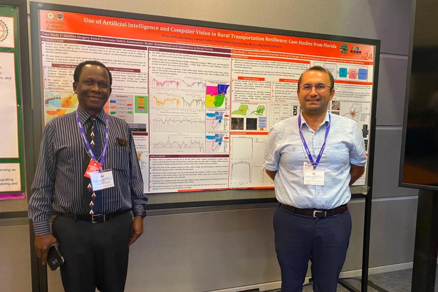 Two researchers stand beside a research poster on "Use of Artificial Intelligence and Computer Vision in Rural Transportation Resilience: Case Studies from Florida," which displays graphs, maps, and data visualizations.